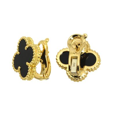 an image of a pair of black and gold earrings