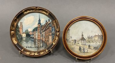 two framed pictures of buildings and people on a street