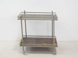 an image of a metal and wood bar cart