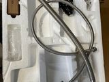 a picture of a box with a hose and a hose in it