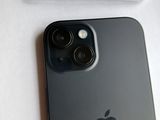 a picture of a black iphone with a camera attached to it