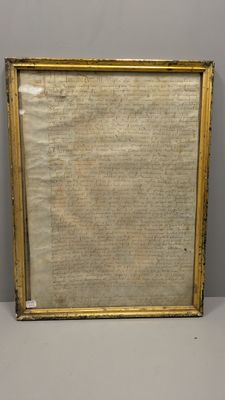 une image encadrée d'or représentant la Déclaration d'indépendance des États-Unis