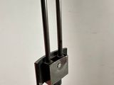 an image of a metal pole with a handle on it