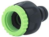 un gros plan sur un raccord de tuyau noir et vert
