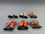 six figurines of knights riding horses and holding spears