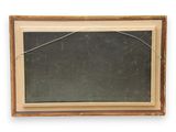 an old blackboard with a broken glass on it on a white surface