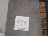 a close up of a piece of metal with a sticker on it