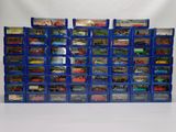 a lot of toy cars that are stacked up together
