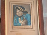 a framed picture of a man in a blue uniform