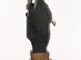 statue of a woman holding a child in her arms