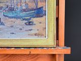 an oil painting of a boat on a wooden easel with a black background