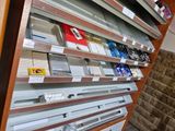 many different types of cigarettes on the shelves in the store