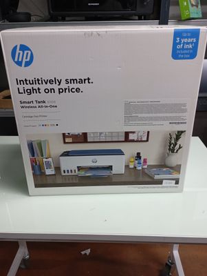 a box on a table with a printer on it