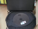 a black box with a black speaker on top of it