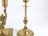 pair of antique brass candlesticks with a bird on the base