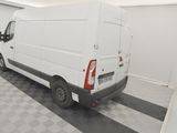 a white van that is parked in a garage