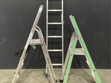 a couple of ladders sitting next to each other in a room