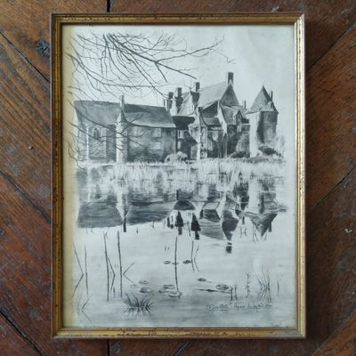 une image représentant un dessin d'une maison posée sur un plancher en bois
