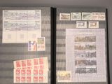 a binder with a lot of stamps and stamps on it