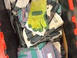 a box full of gloves, gloves, and other items in it