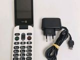 an image of a cell phone and charger on a table