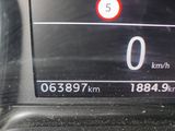 a close up of a car ' s dashboard showing the speed limit