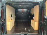 a black van with yellow boxes in the back of it