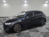 a picture of a black car parked in a garage