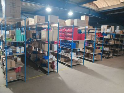 a large warehouse filled with lots of boxes and shelves