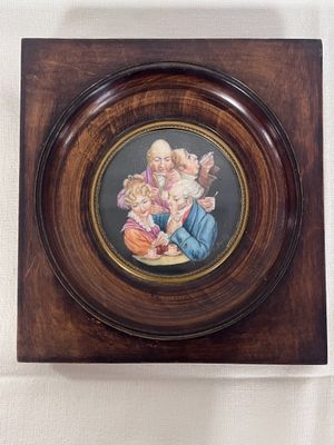 a picture of a picture of a family on a wall