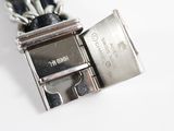 a metal belt with a metal buckle attached to it