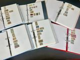 tout un tas de timbres de toutes sortes dans un classeur
