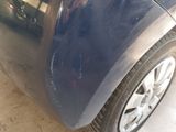 a close up of a car ' s front bumper