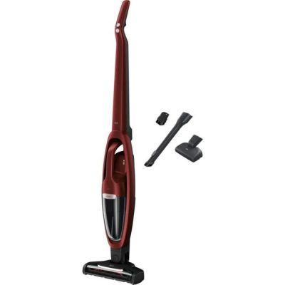 un aspirateur rouge et noir muni d'une poignée filaire