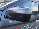 a close up of a car with a side view mirror