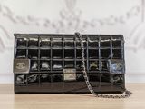 Pochette Chanel à rabat en cuir d'agneau matelassé noir