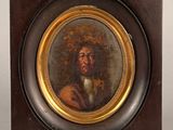tableau représentant un homme portant un chapeau et une barbe, dans un cadre en bois