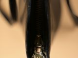a close up of a black purse with a zipper