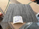 a picture of a piece of carpet with a price tag on it