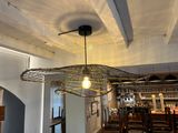 a light that is hanging from the ceiling in the room