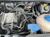 a picture of a car engine with its hood open