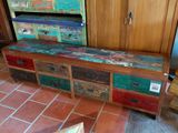a bench made out of old wooden crates in a living room