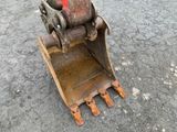 a large excavator that is sitting on the ground