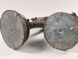 a close up of a pair of glasses on a white surface