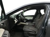 the interior of a car with the door open and the driver ' s seat down