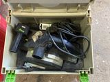 a tool box with tools in it sitting on the ground