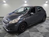 a picture of a gray car parked in a garage