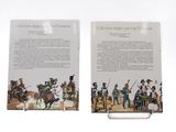 two books on a white surface with a picture of a man on a horse and a man on a horse