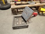 a pile of different types of tools sitting on a pallet
