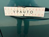 a sticker on the door of a car that says vauto